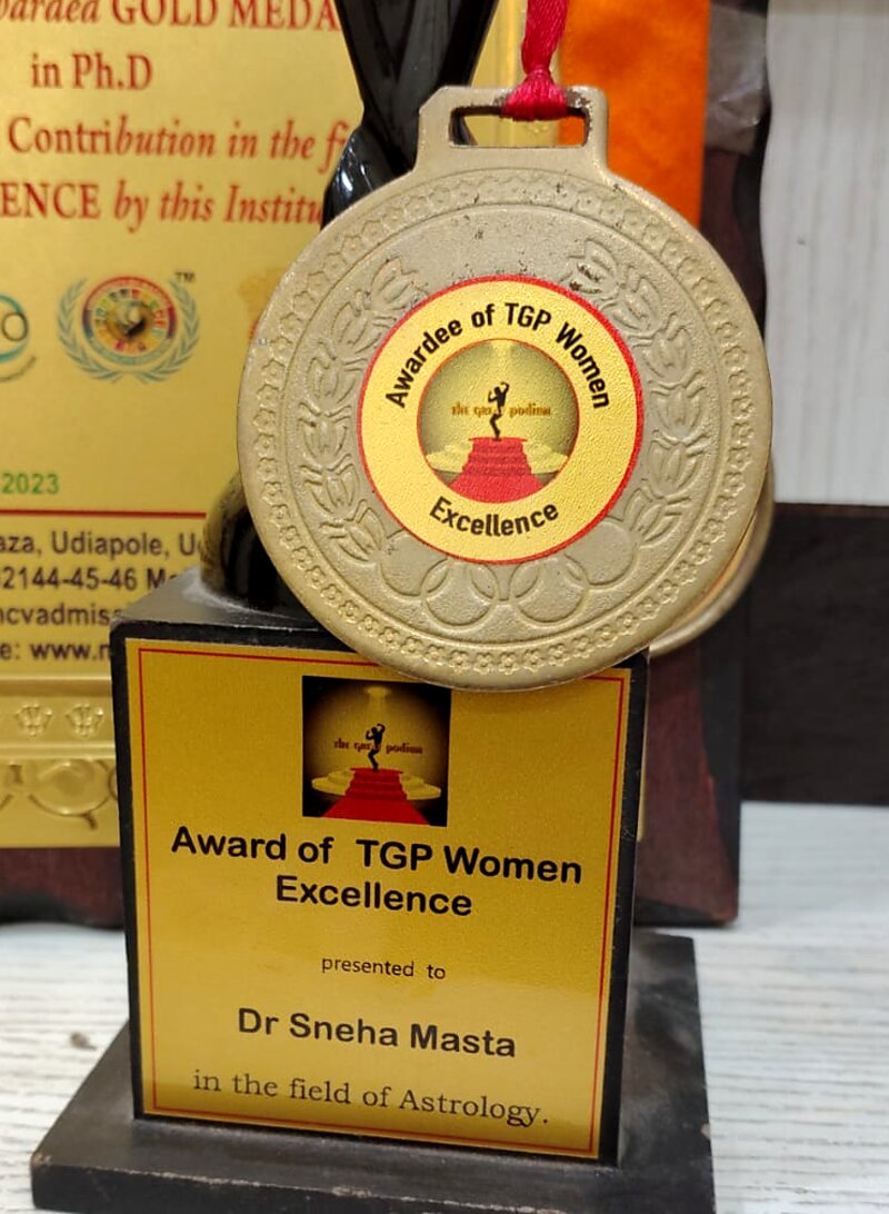 TGP Women Excellence Award trophy and medal presented to Dr. Sneha Masta in the field of Astrology